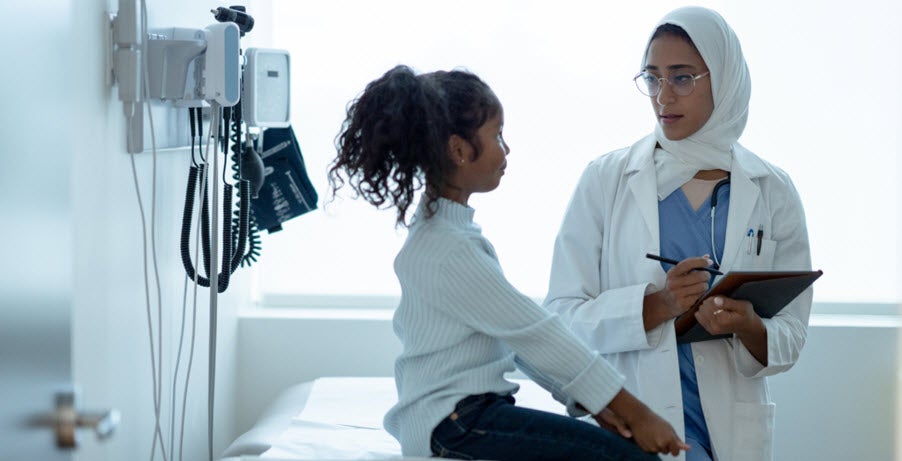 Image of doctor and child patient